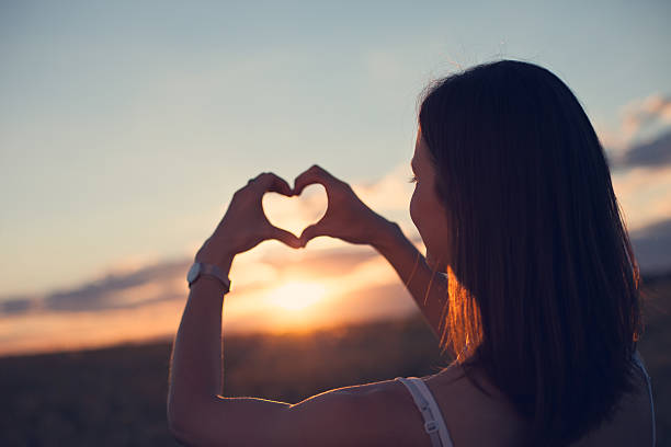 istock Girl making heart symbol with her hands 491966046