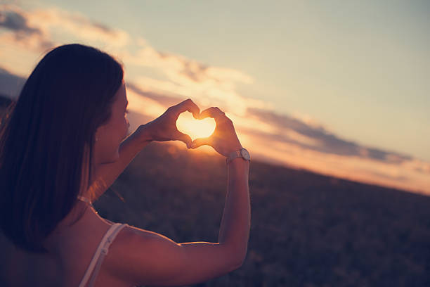 istock Girl making heart symbol with her hands 491966056