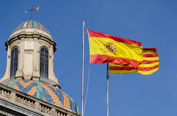 Spanish and Catalan flags stock photo