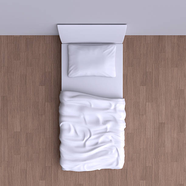 istock Bed with pillow and blanket in the corner room 491972192