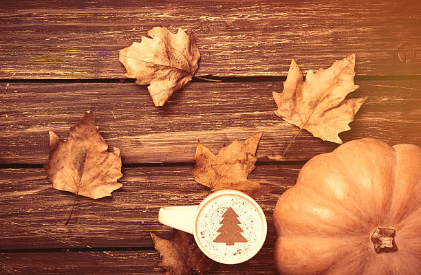 istock cup of cappuccinoand pumpkin 491974954