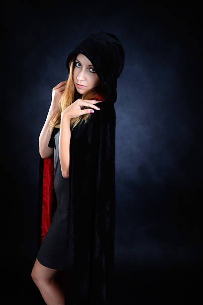 istock young woman in a mantle 491976790