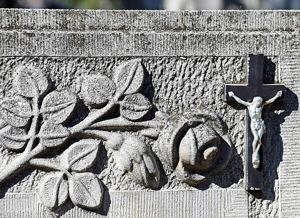 istock Cross on the tombstone 491977420
