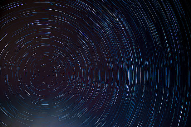 istock circle star trail at the north pole stars 491977790