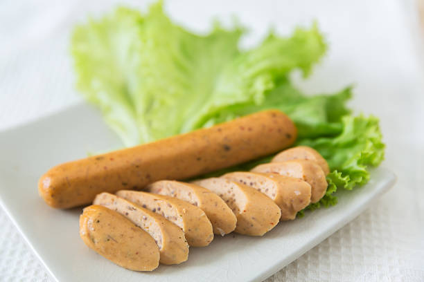 vegetarian sausage vegetarian sausage, tofu sausage- vegetarian festival meat substitute stock pictures, royalty-free photos & images