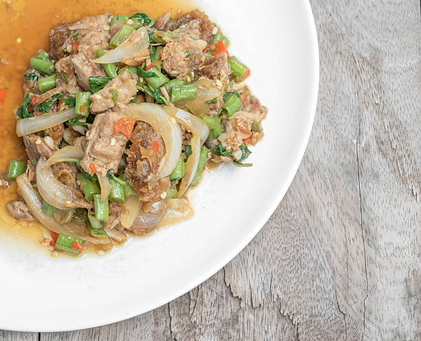 istock Basil Fried Rice with stir fried crispy Pork, Thai  food 491986864