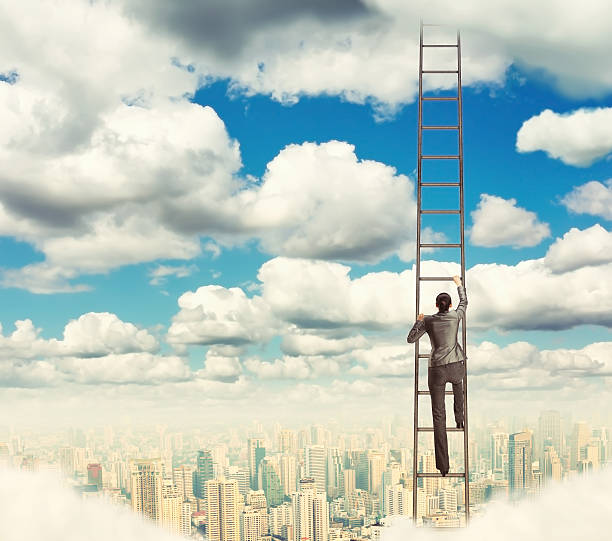 istock Woman climbing the ladder 491989352