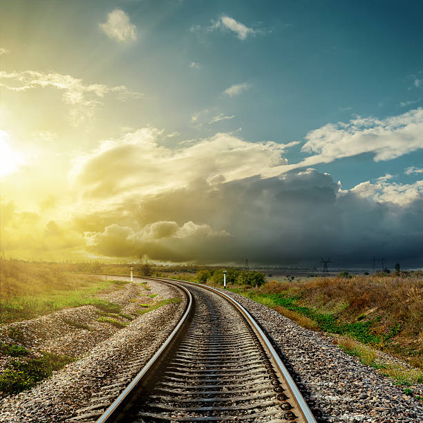 istock railroad to horizon and sunset in clouds 491991896