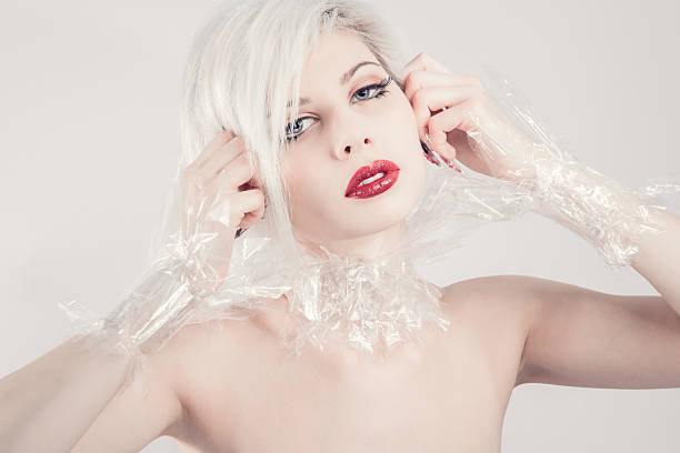 istock Blonde fashion model in plastic 491992473