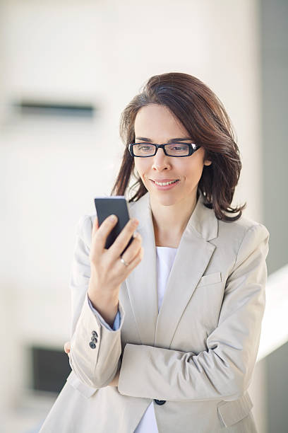 istock Businesswoman Using Mobile Phone 491993864