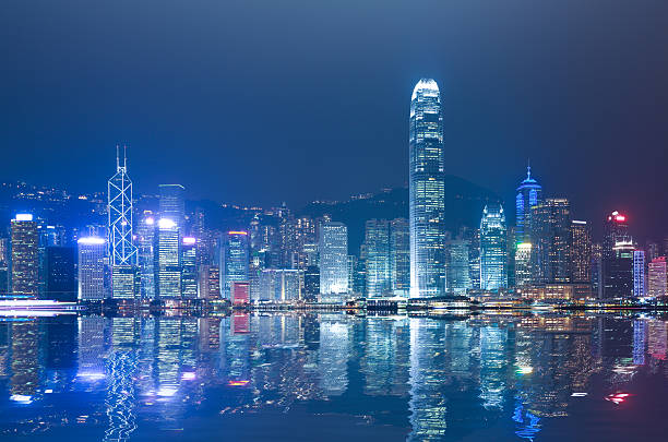 istock HK Victoria Harbour of skyline night 491995119