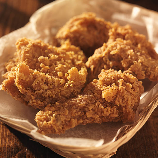 fried chicken basket in golden light