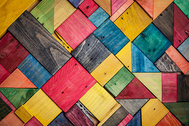 background texture of colored wood pieces background texture of stained, painted  wood pieces constructivism stock pictures, royalty-free photos & images