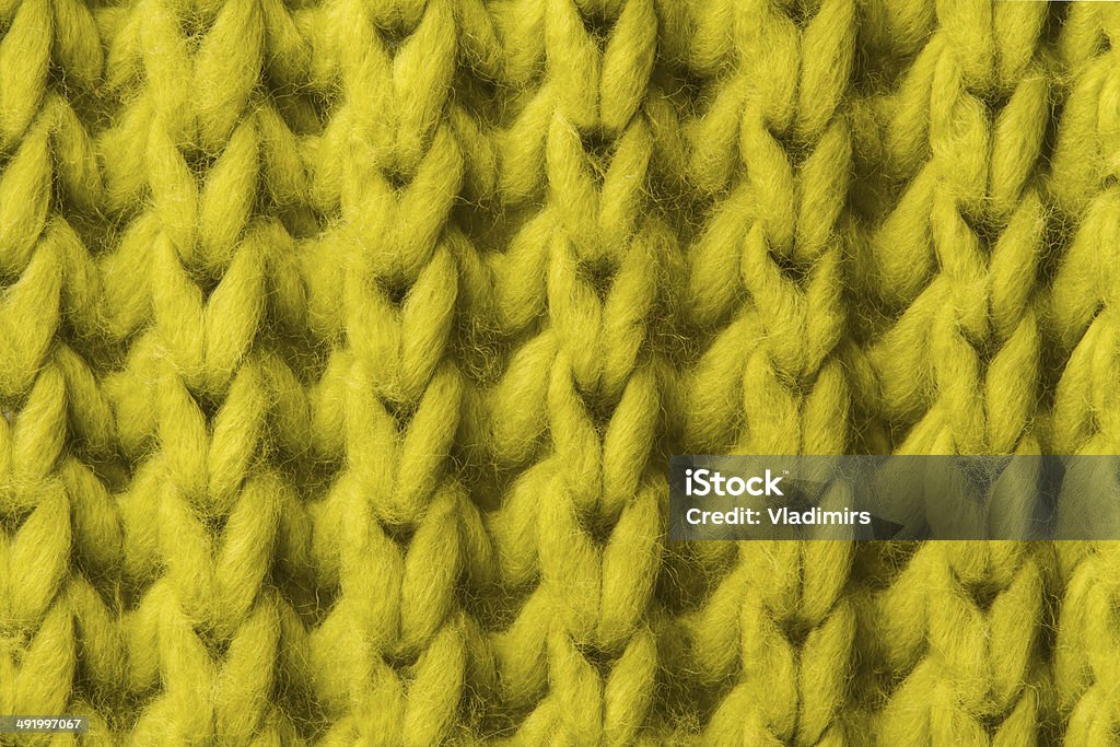 woolen texture background, knitted wool fabric, green hairy fluffy textile woolen texture background, knitted wool fabric, green hairy fluffy textile. Backgrounds Stock Photo