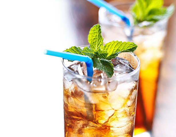 istock iced sweet tea with blue straw 491997077