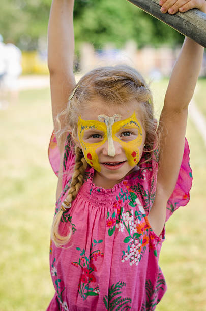 istock girl with face-painting 492002450