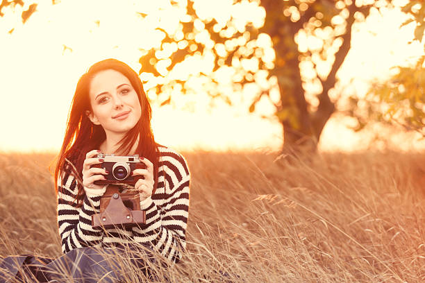 Woman with vintage camera