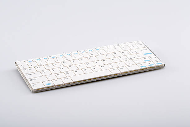 istock Portable white wireless keyboard smartphone and tablet 492007096