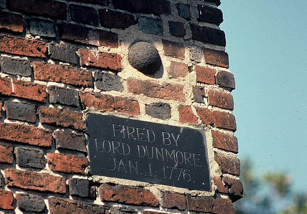 istock Cannonball embedded in a church wall. 492008744