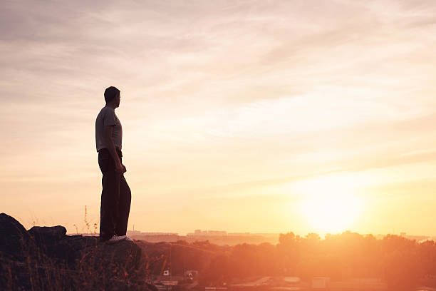 istock Silhouette of a man at the sunset on the mountain 492013144