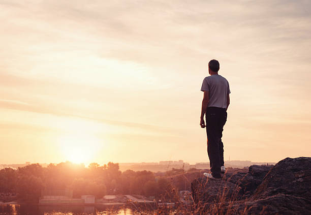 istock Silhouette of a man at the sunset on the mountain 492013158