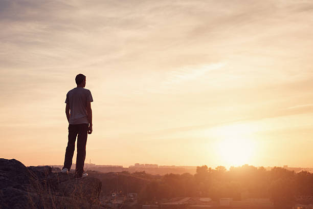 istock Silhouette of a man at the sunset on the mountain 492013172