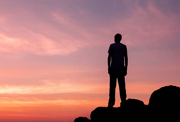 istock Silhouette of a man at the sunset on the mountain 492013208