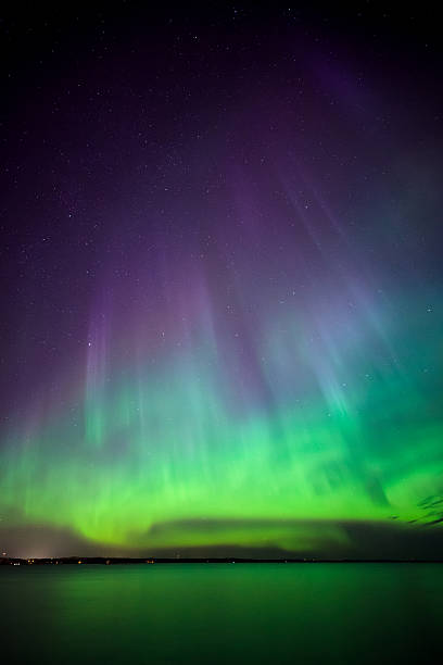 istock Northern lights over lake in finland 492013918