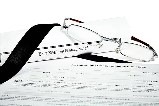 istock Will and Testament with Glasses Pen and Income Tax Return 492016068