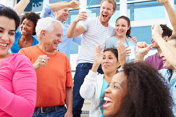 istock Spectators Cheering At Outdoor Sports Event 492023037