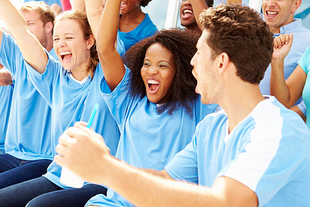 istock Spectators In Team Colors Watching Sports Event 492023167