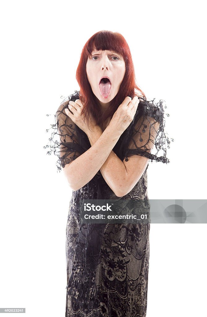 Mature woman sticking out her tongue Adult Stock Photo