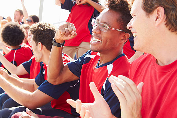 istock Spectators In Team Colors Watching Sports Event 492023519