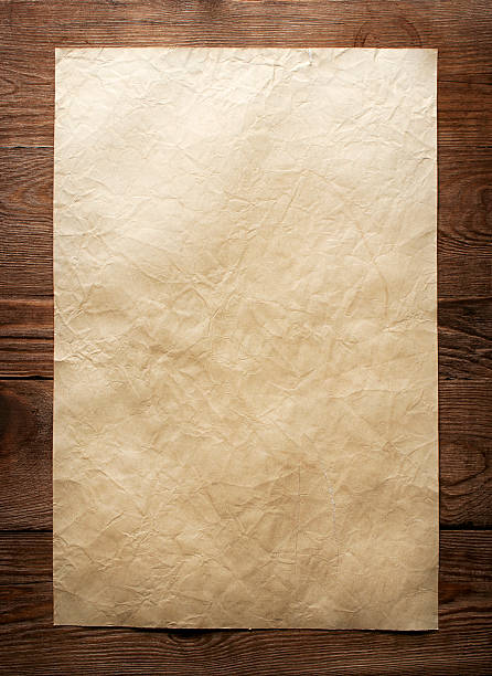 istock old paper on brown wood texture with natural patterns 492023869