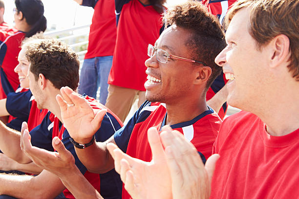 istock Spectators In Team Colors Watching Sports Event 492023891