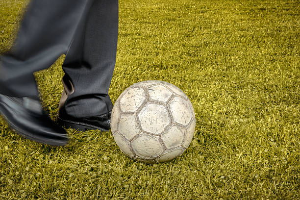 istock Businessman playing with soccer ball - retro-style 492024431