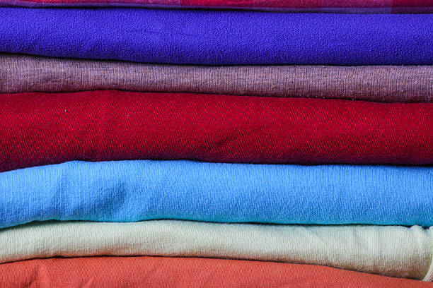 istock Pile of colorful clothes 492024663