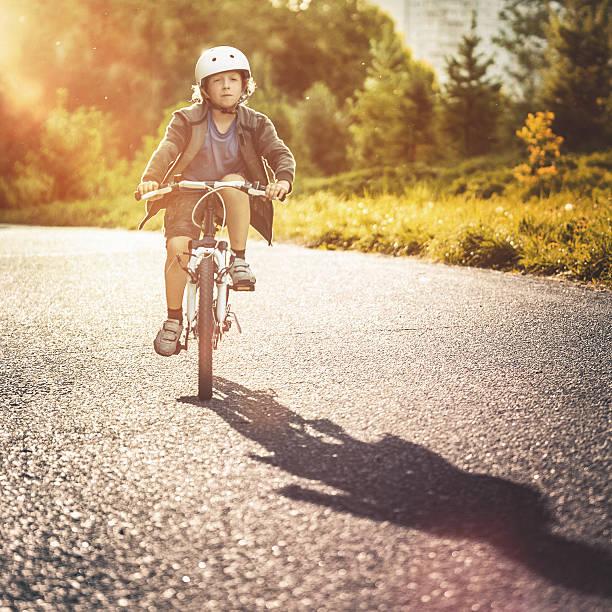 istock Riding a bike in the park 492025259
