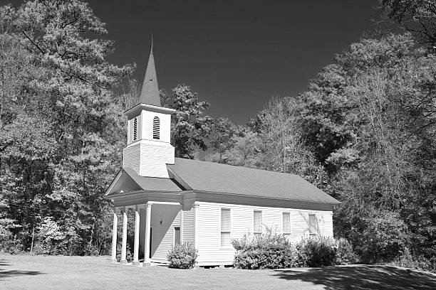 istock White church in the woods 492030878