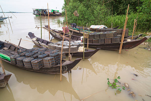 istock Fishing boats on Ywe River in Myanmar 492035718