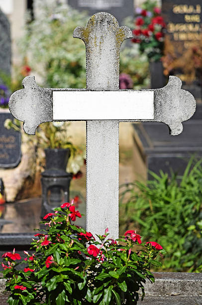 istock Stone cross in the public cemetery 492039706