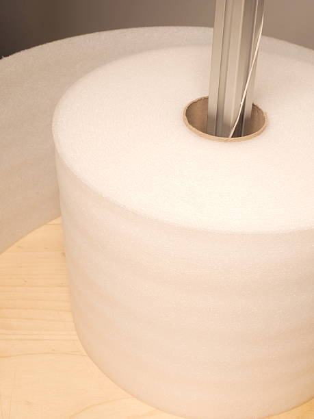 istock Roll of white industrial packaging foam on a reel 492041008