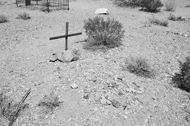 Rhyolite is a ghost town in Nye County, in the U.S. state of Nevada. It is in the Bullfrog Hills, about 120 miles (190 km) northwest of Las Vegas, near the eastern edge of Death Valley. The town began in early 1905 as one of several mining camps that sprang up after a prospecting discovery in the surrounding hills. During an ensuing gold rush, thousands of gold-seekers, developers, miners and service providers flocked to the Bullfrog Mining District. Many settled in Rhyolite, which lay in a sheltered desert basin near the region's biggest producer, the Montgomery Shoshone Mine.