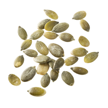 Pumpkin seeds on white background