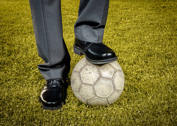 istock Businessman playing with soccer ball - retro-style 492055111