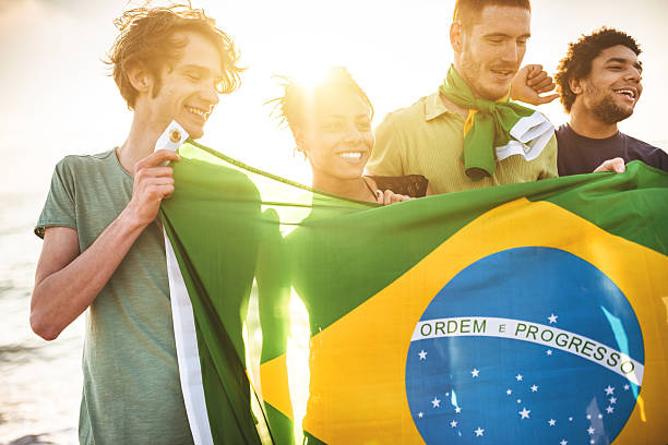 istock brazil supporter cheering togetherness at the match 492056811