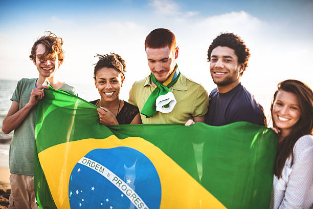 istock brazil supporter cheering togetherness at the match 492056823