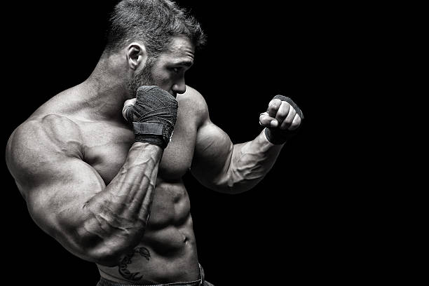 poderoso fighter - human muscle body building exercising black and white - fotografias e filmes do acervo