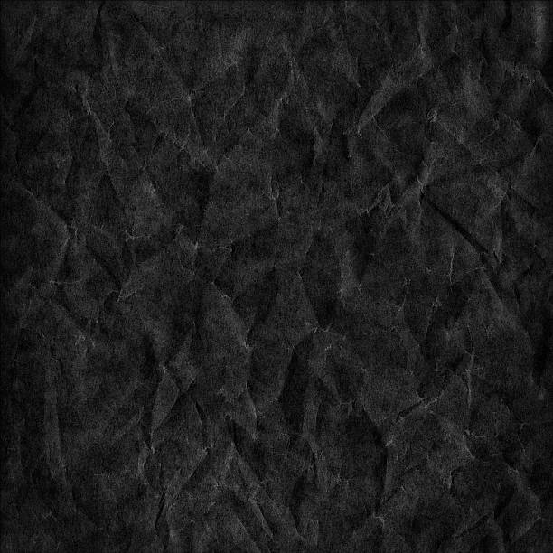istock Black abstract grunge background from wrinkled wax paper 492071330