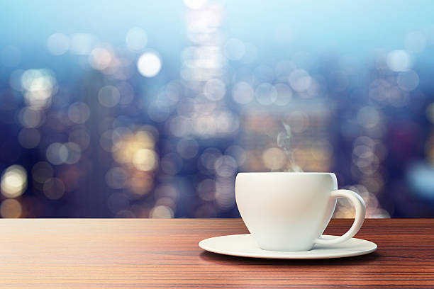 istock Cup of coffee on a wooden table 492072372